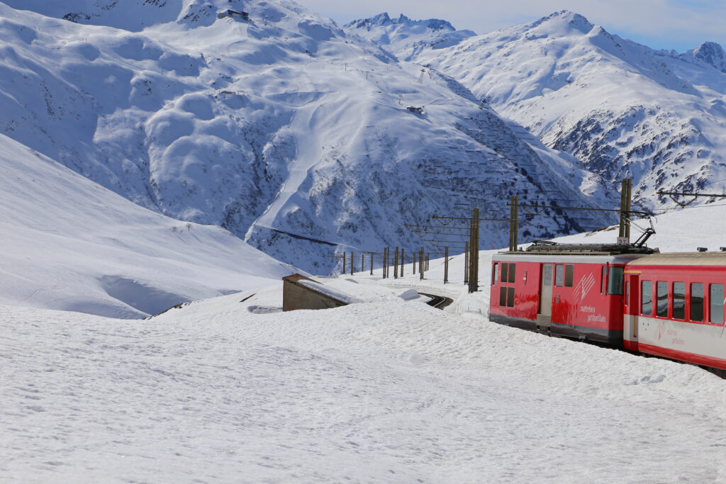 Gemsstock ski area above Andermatt with railway